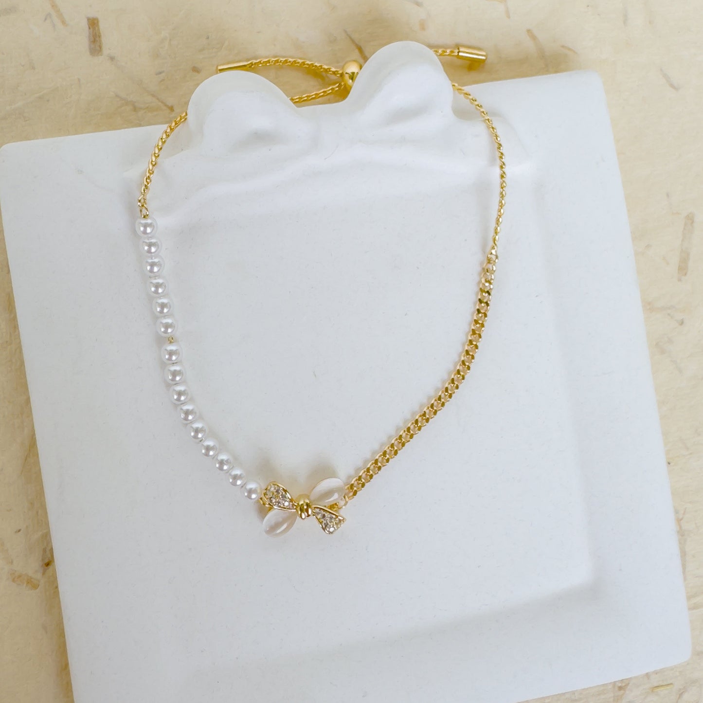 PEARL BOW ADJUSTABLE BRACELET